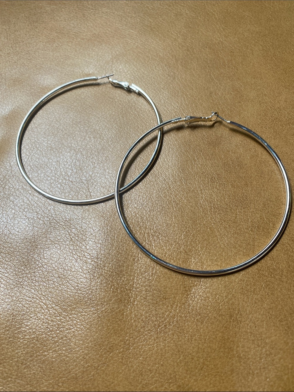 Large 2.75” diameter silver tone hoops